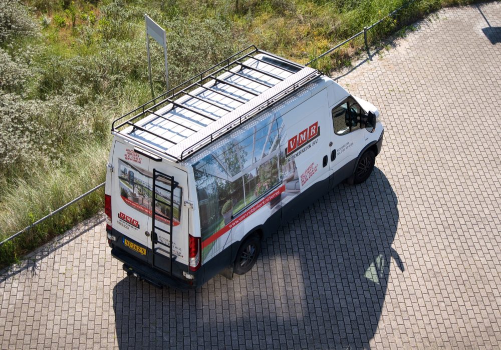 Bedrijfsbus-VMR Shot van bovenaf van de bedrijfsbus van VMR Vouwwanden